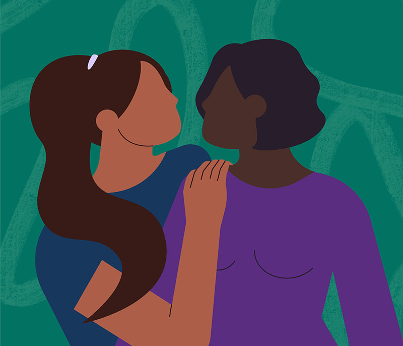 Illustration of two women over a dark green background. The woman on the left has long brown hair in a ponytail and brown skin and is wearing a dark blue top. She is hugging the woman on the right, a black woman with short black hair who is wearing a dark purple top.